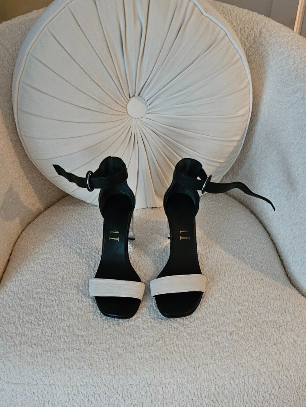 Black and white leather sandals
